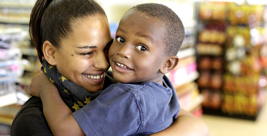 Mom and son in grocery store